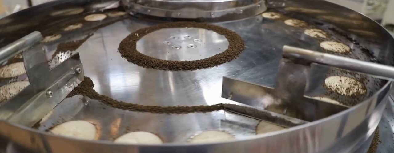 Saurabh Flexipack automatic packaging machine filling coffee in operation